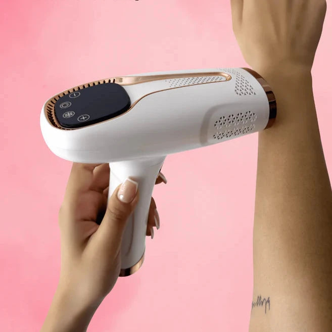 RxGlacier Ice Cool IPL hair removal device surrounded by ice cubes on a pink background.